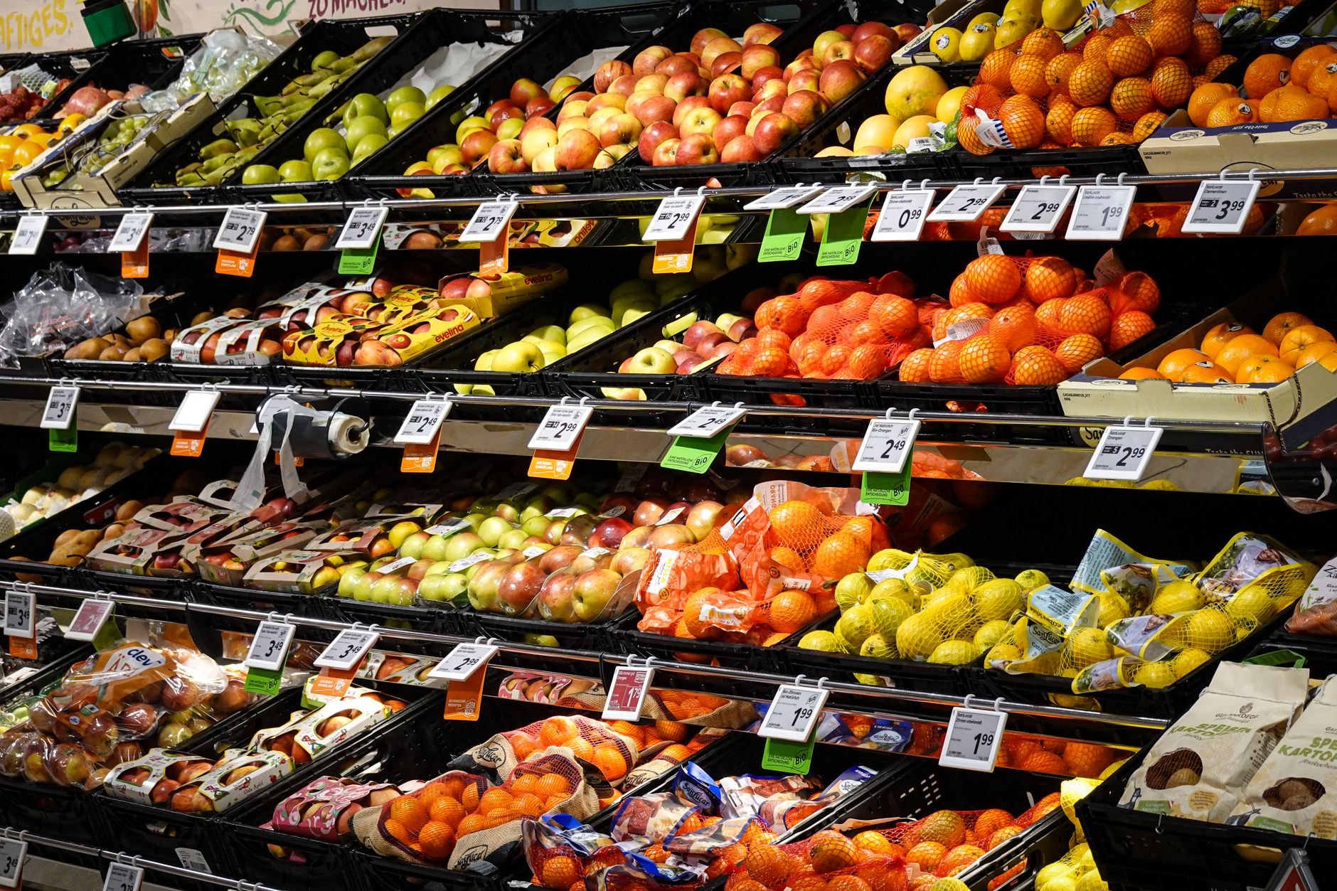 Fresh seasonal fruit assortment displayed in produce section
