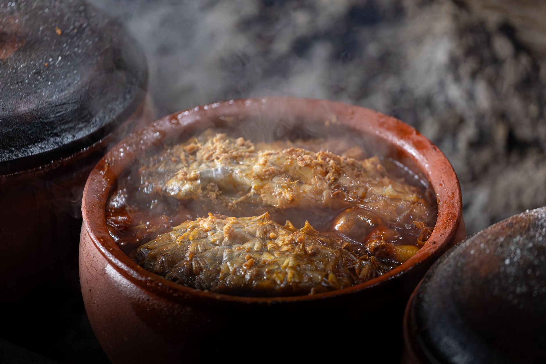 Hearty Turkish home-style stew with vegetables served in a clay pot