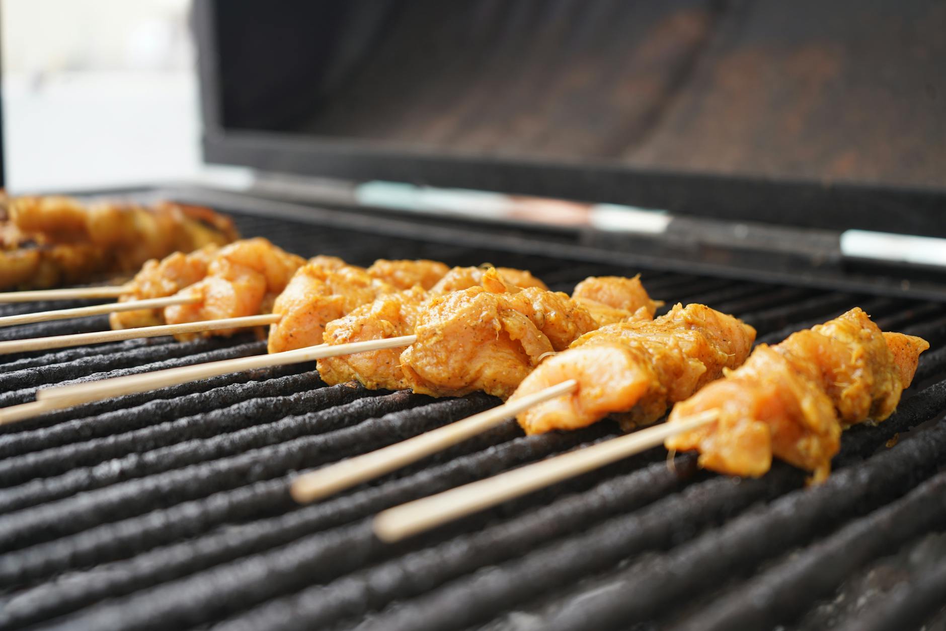 Marinated lamb and chicken skewers expertly prepared and ready to cook